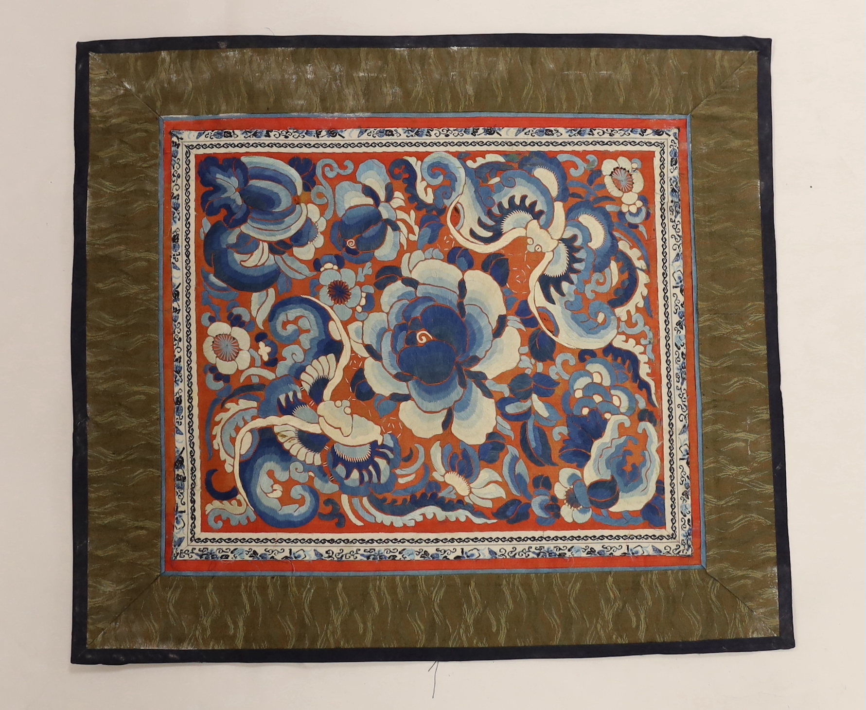 Nine Chinese silk embroidered panels, framed with silk damask borders, circa 20th century, largest 37cm x 41cm